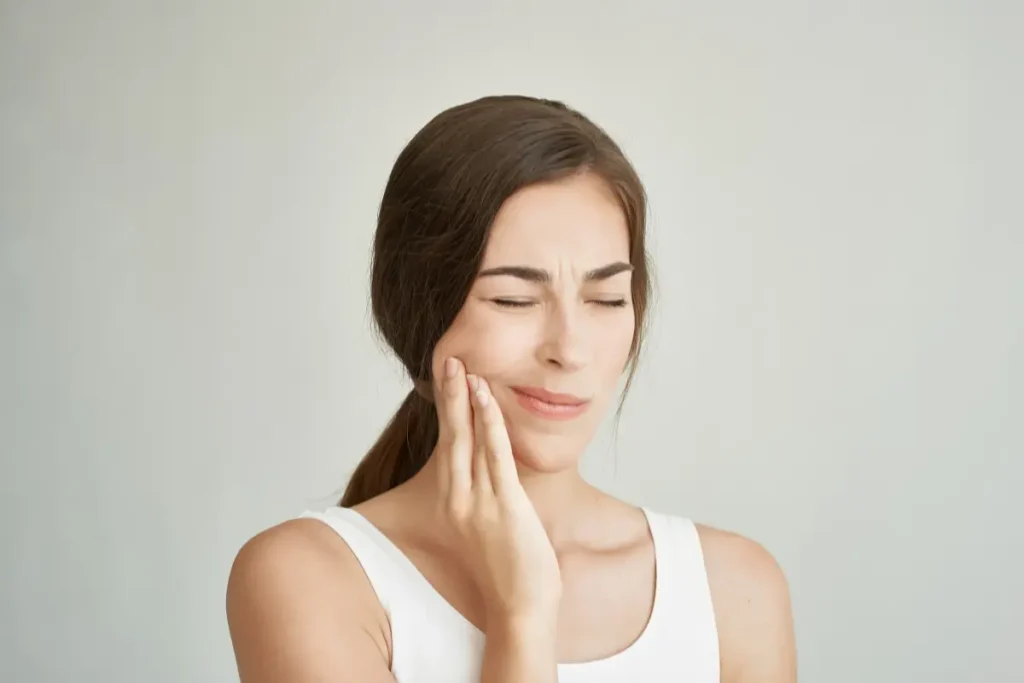 patient experiencing TMJ pain