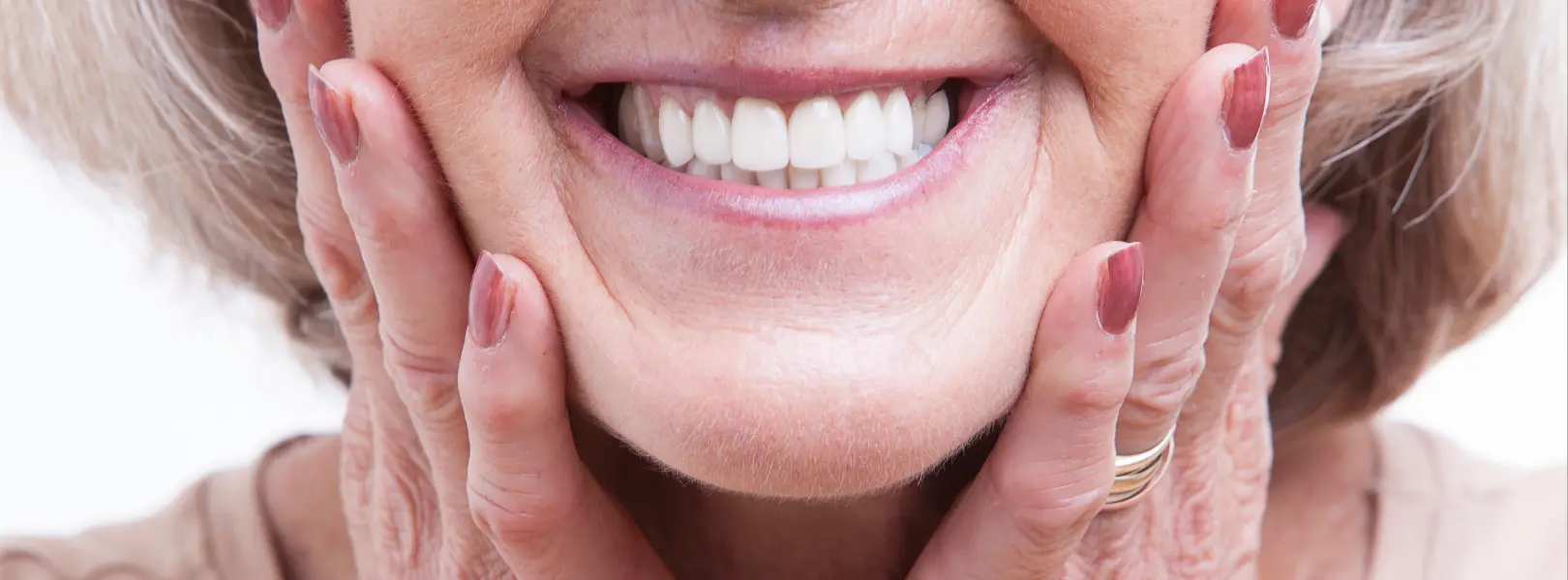 woman with dentures smiling